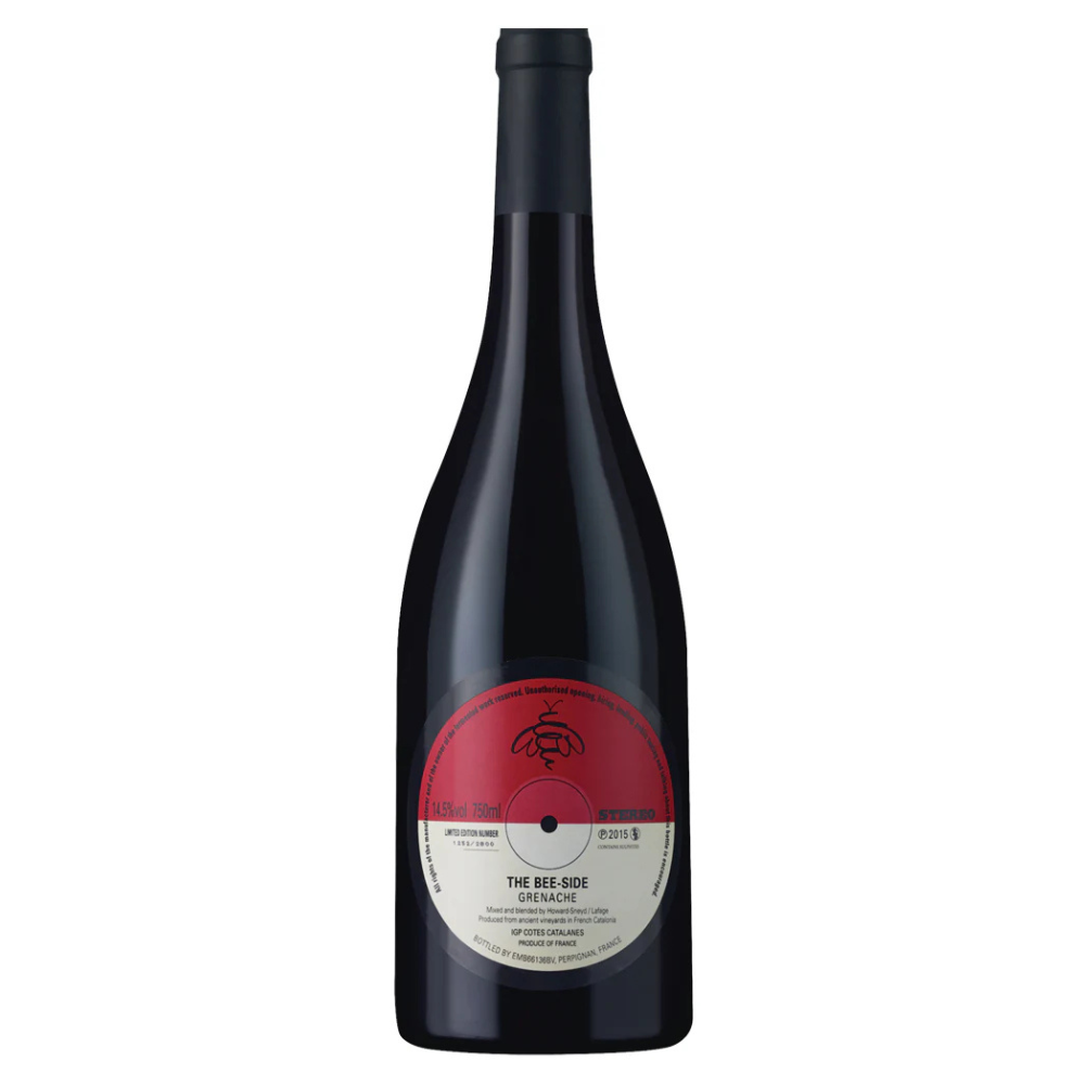 Wine bottle with a red label on a white background