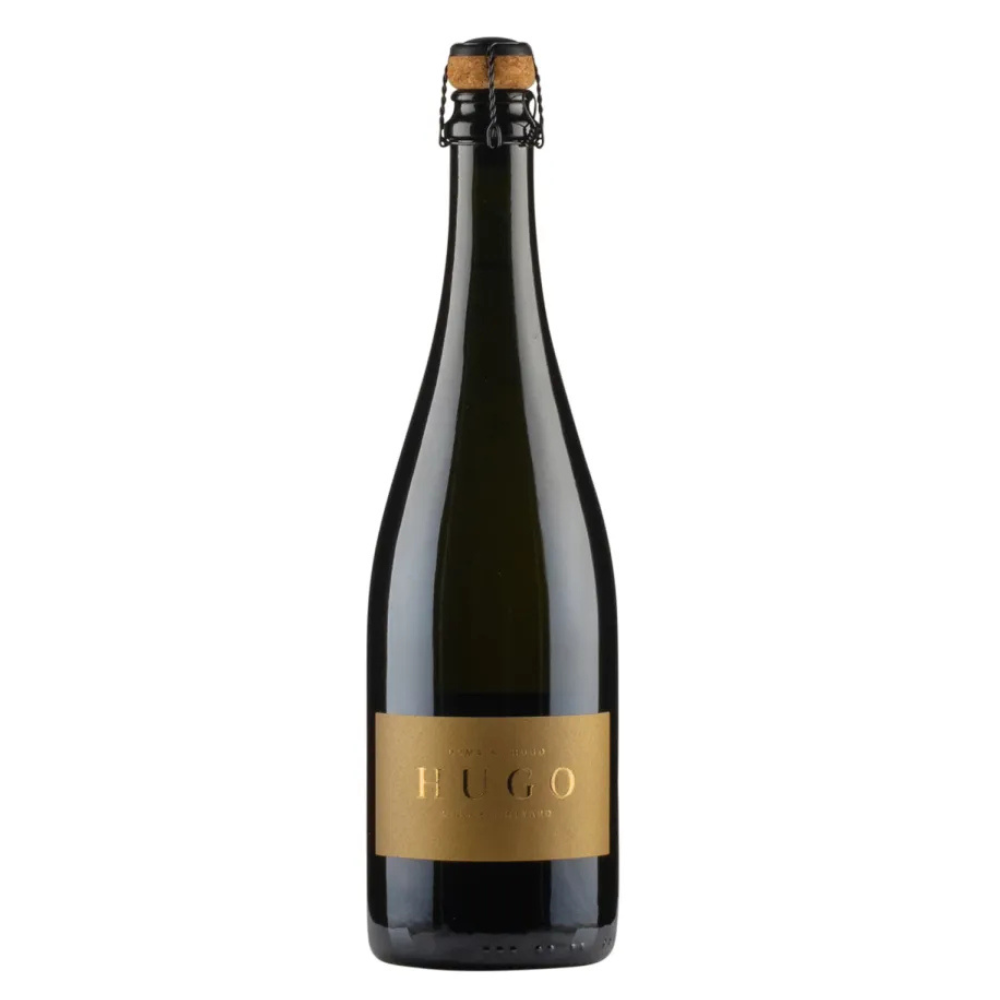 Domaine Hugo. Black wine bottle with gold label on a white background